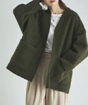 Ring wool over cardigan