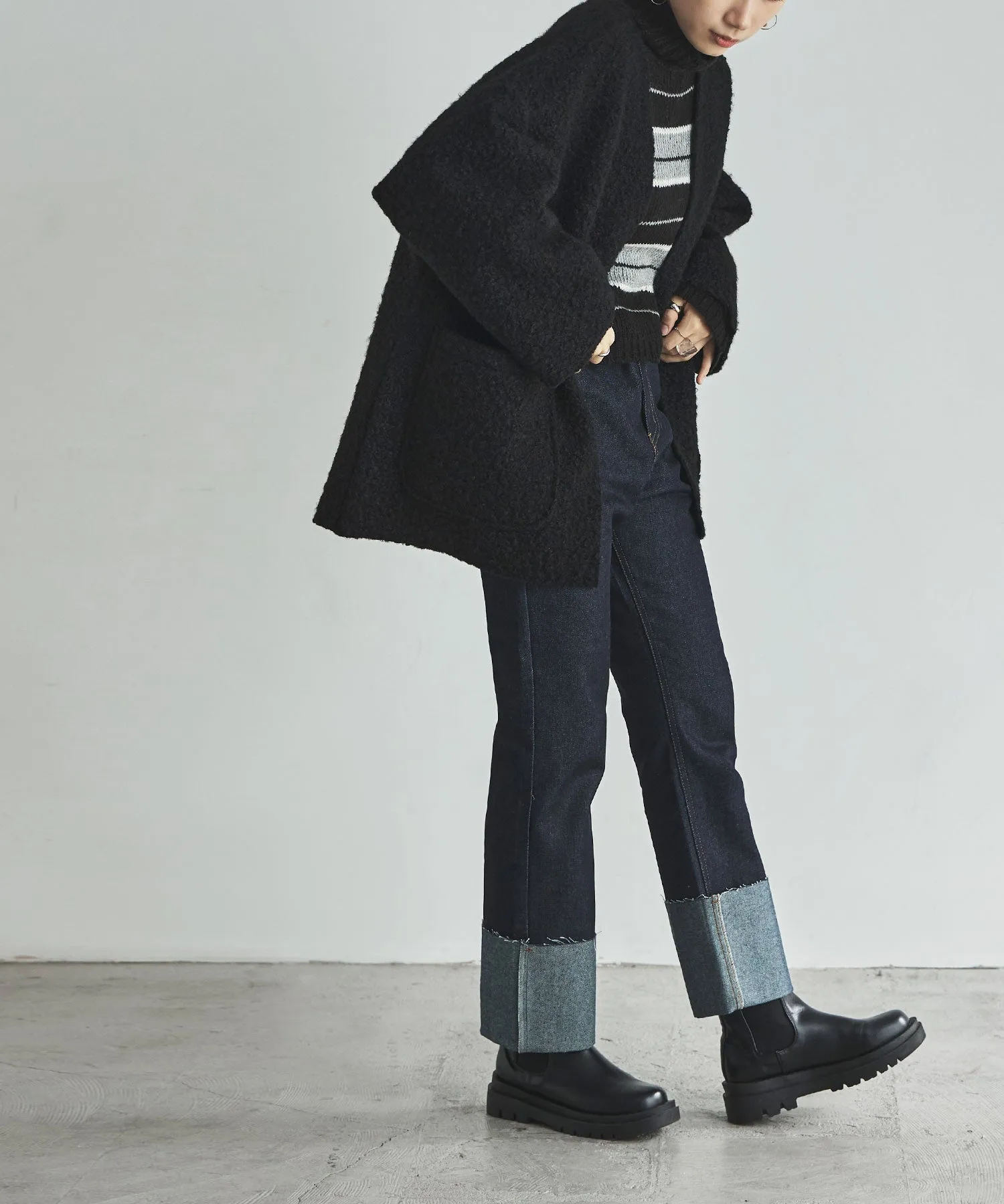 Ring wool over cardigan