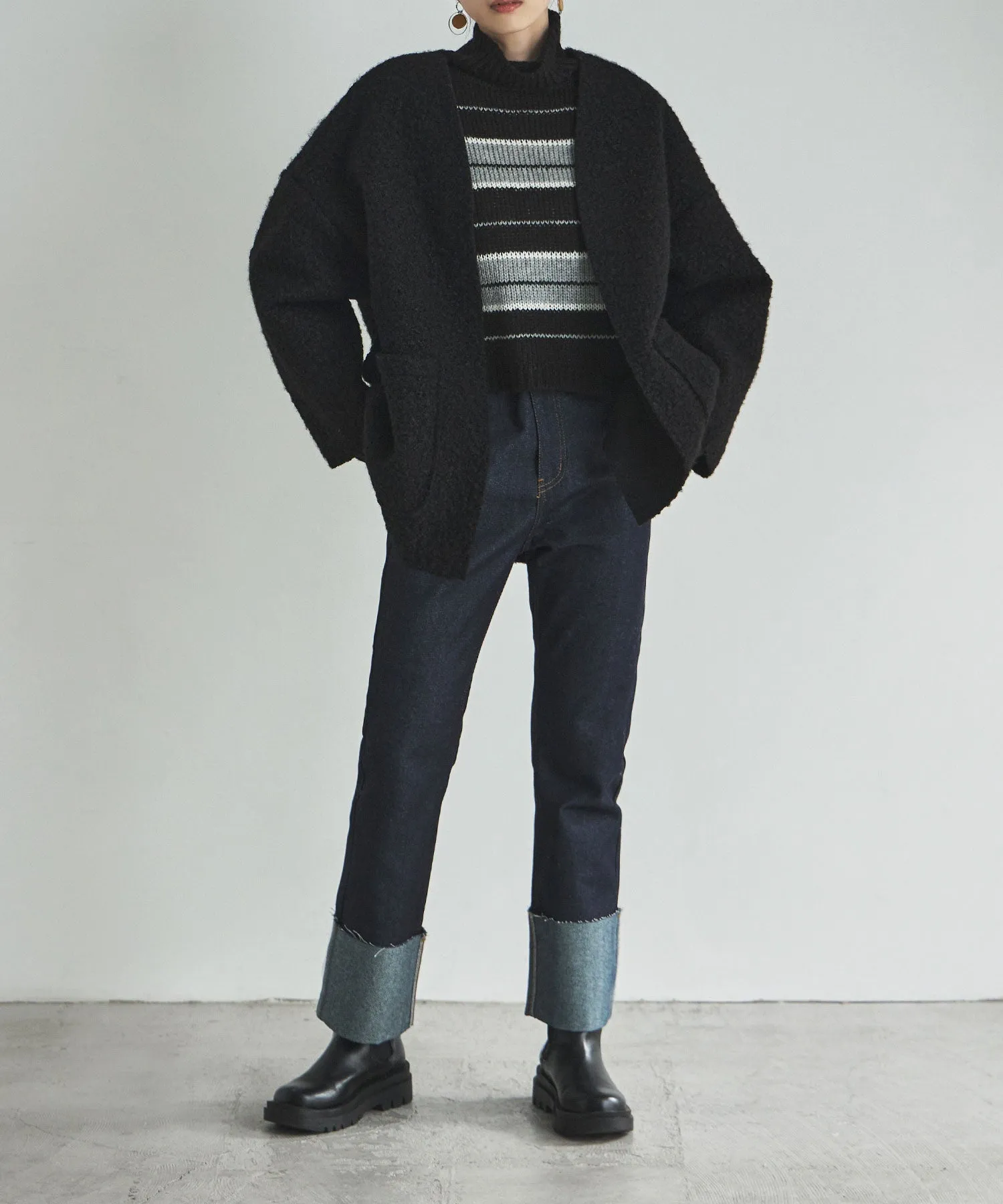 Ring wool over cardigan