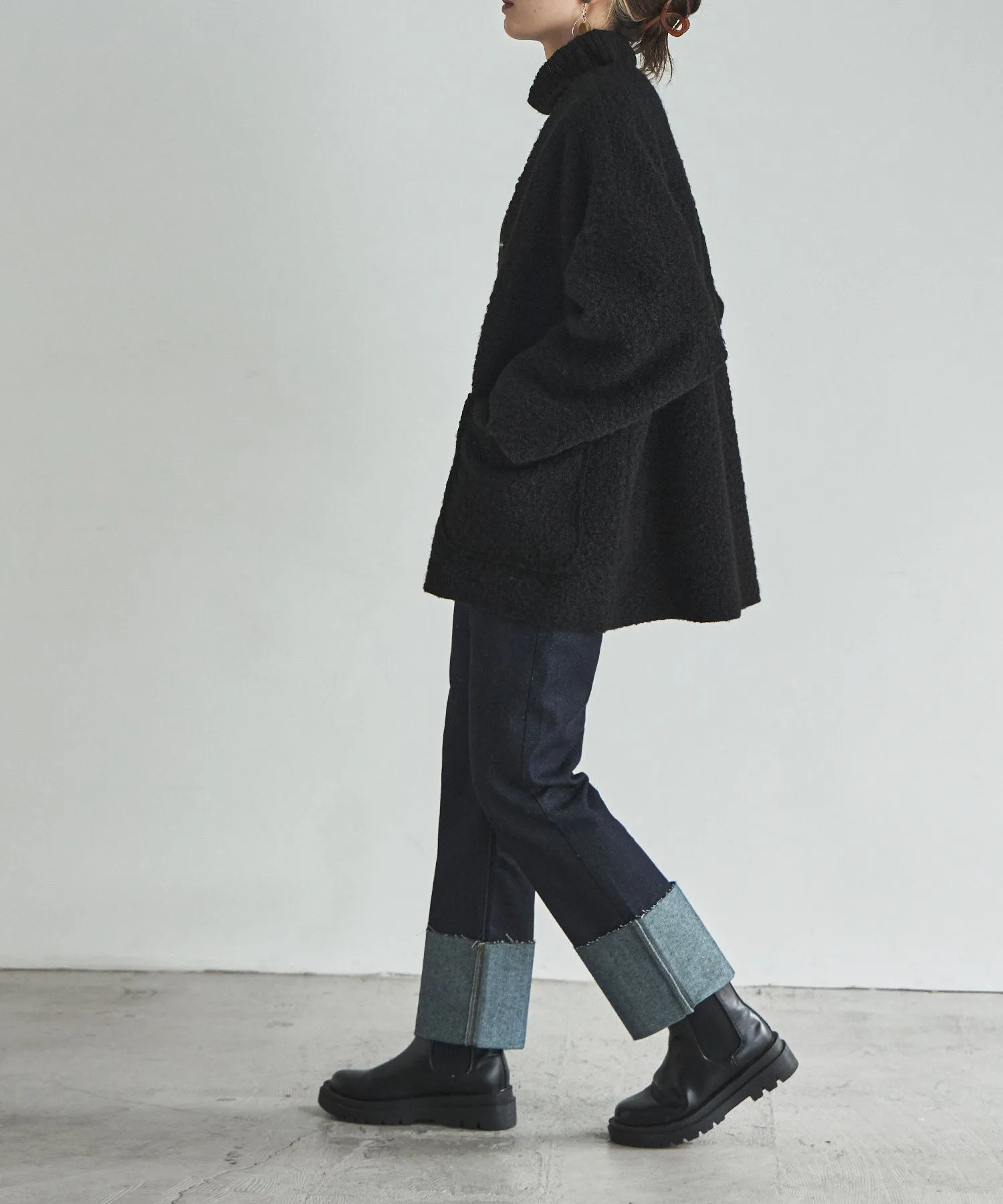 Ring wool over cardigan